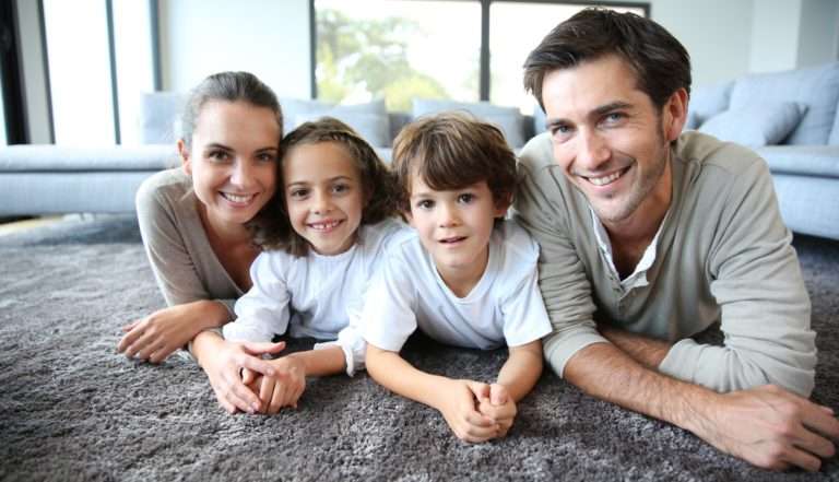 happy family on clean carpet